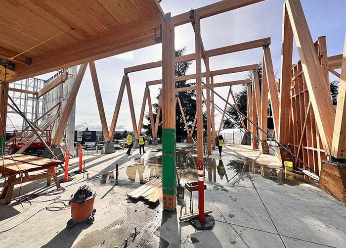 a building is being framed with wood